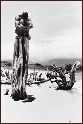 Tom Bianchi original gelatin silver print depicting a male nude sitting on a tree stump