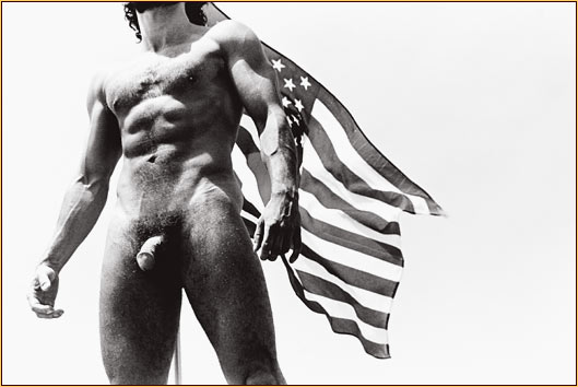 Tom Bianchi original gelatin silver print depicting a male nude standing in front of the American flag